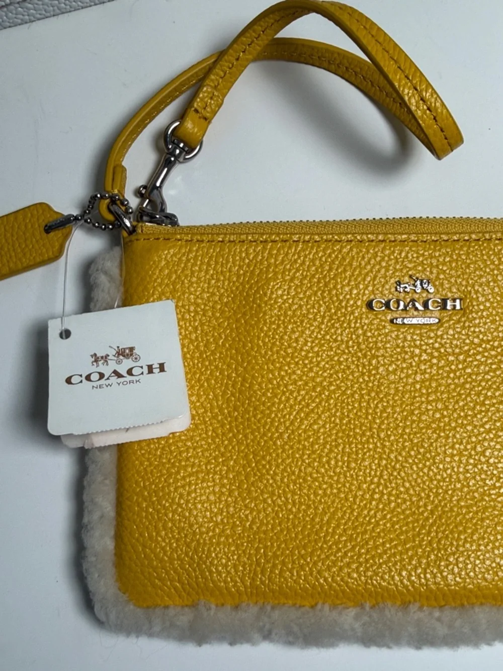NWT COACH Yellow Pebbled Leather Wristlet with Shearling Trim